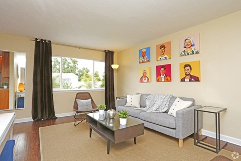 a living room with a couch and a table